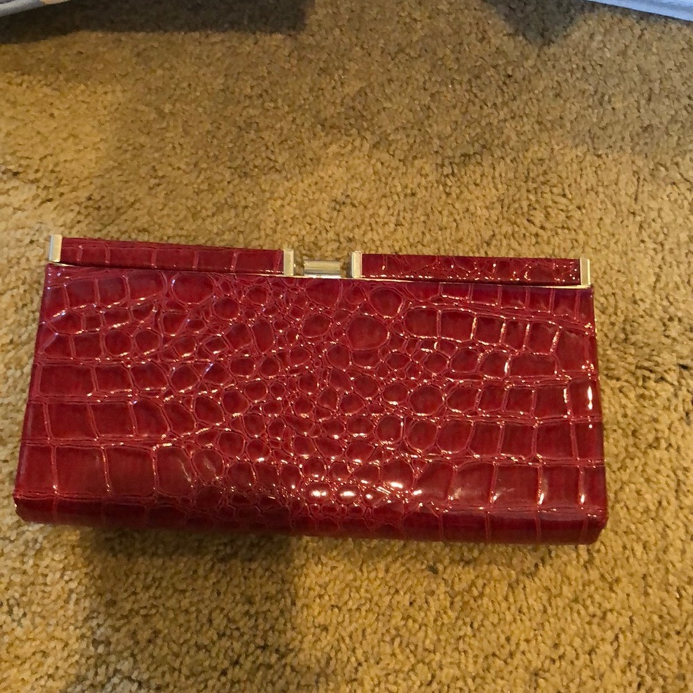 red wallet or hand purse
